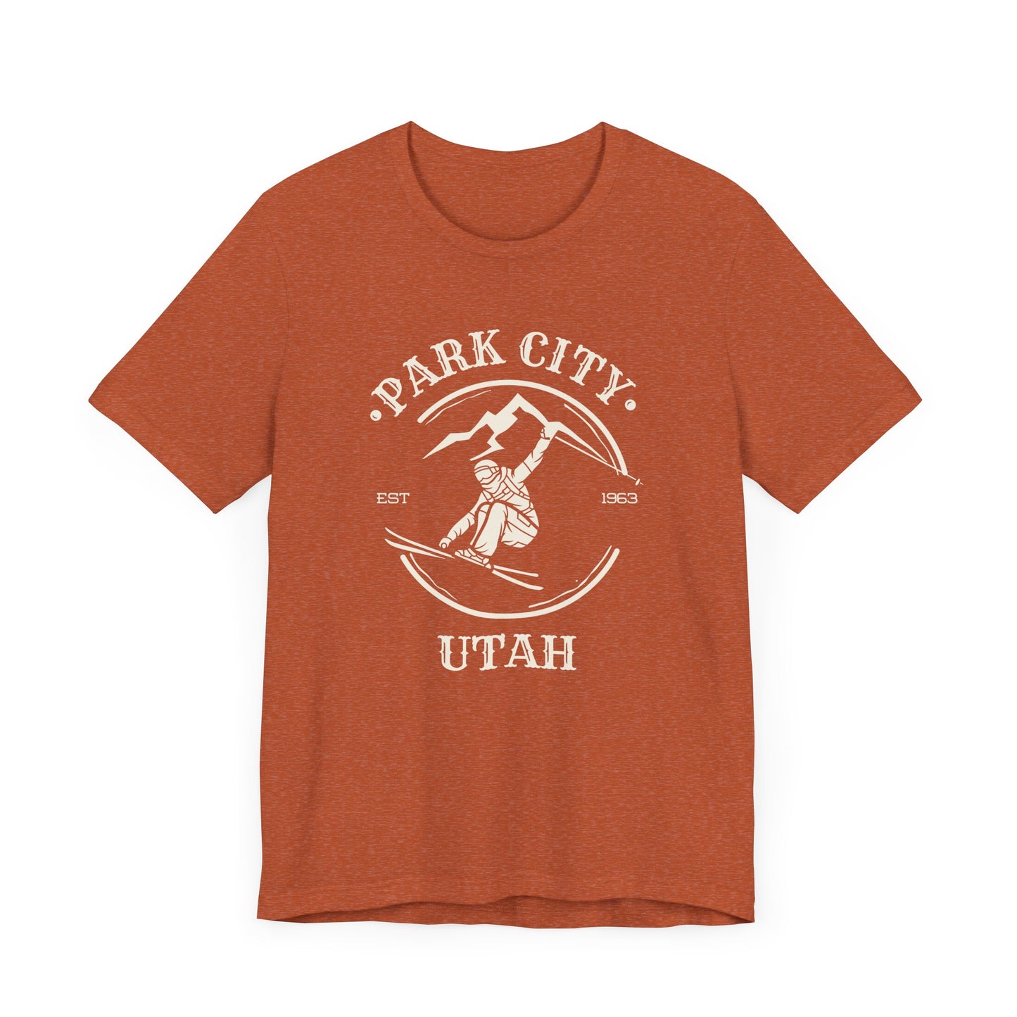 Autumn orange colored t-shirt with off-white skier graphic and Park City Utah text
