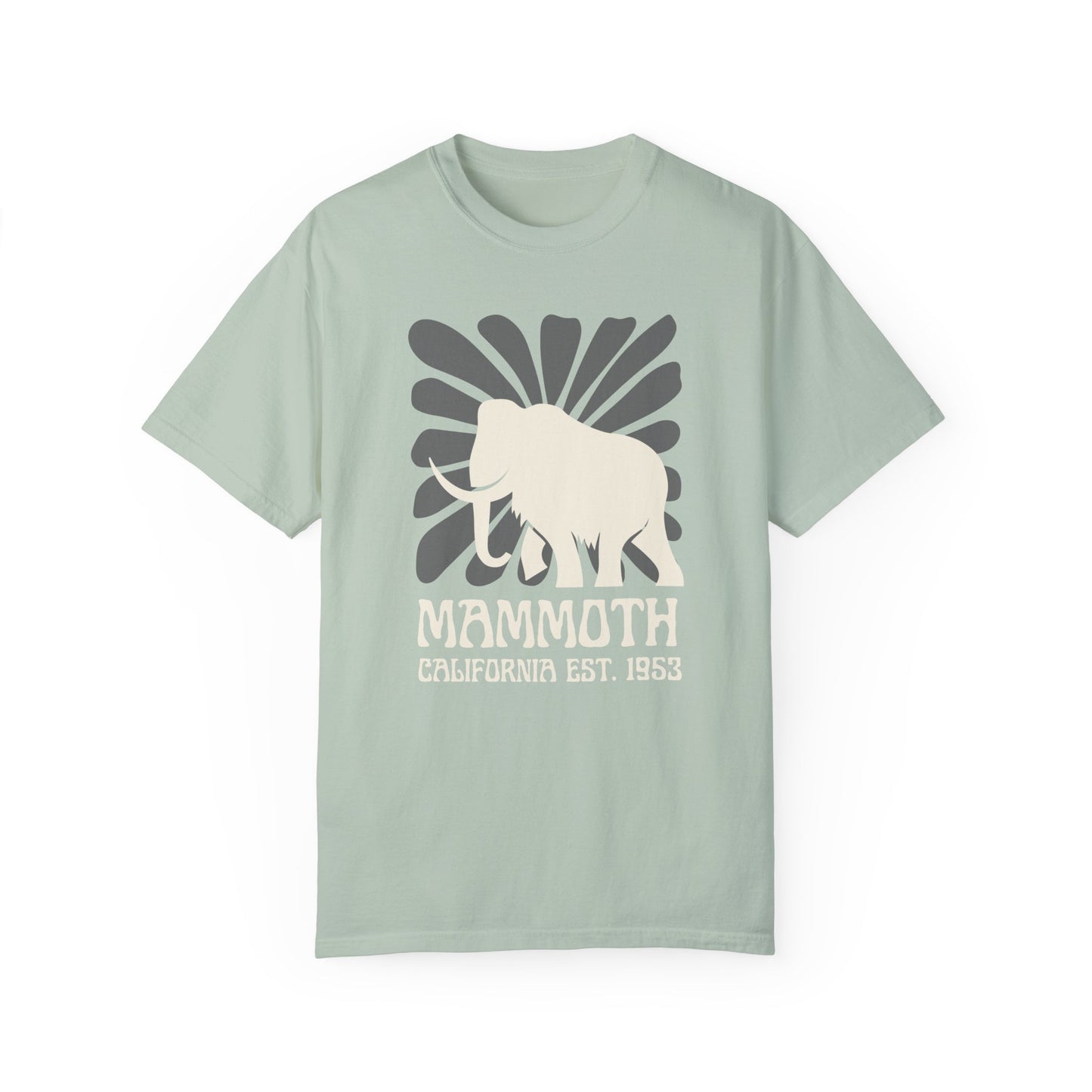 A light green t-shirt featuring a silhouette of a mammoth with the text 'MAMMOTH CALIFORNIA EST. 1953' on the front.