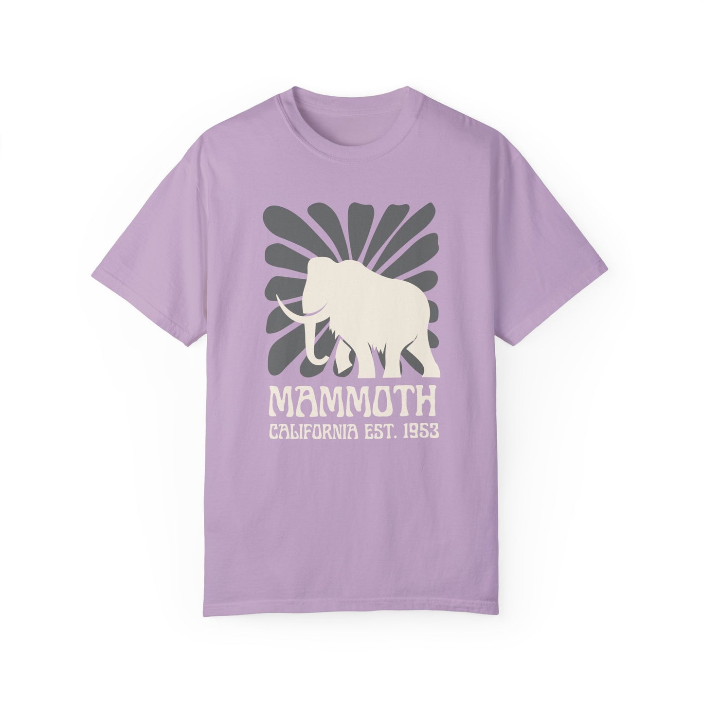A purple t-shirt featuring a silhouette of a mammoth with the text 'MAMMOTH CALIFORNIA EST. 1953' on the front.