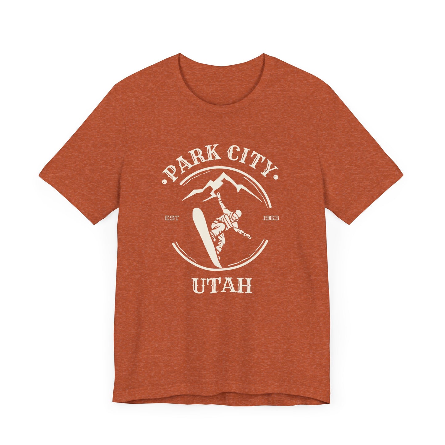 Orange crew neck t-shirt with 'Park City Utah' text and a graphic depicting a snowboarder on the front.