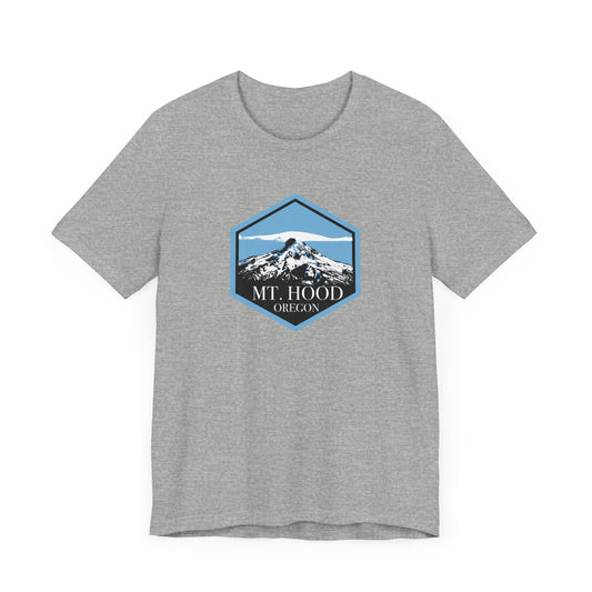 A gray T-shirt featuring a badge design of Mount Hood, Oregon.
