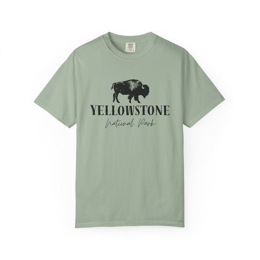 Green t-shirt with graphic design and text on a white background